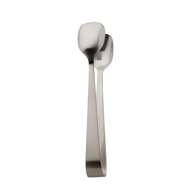 Como stainless steel sugar tongs with polished finish and modern arched design by Robbe & Berking.