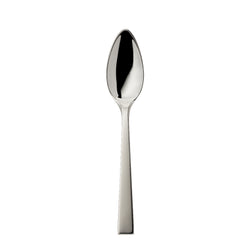 Riva dessert spoon with rounded pointy bowl and squared handle.