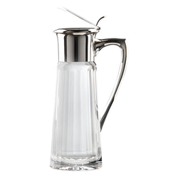 Luxury water jug Opera in sterling silver and cut crystal with hinged lid and handle by Sonja Quandt – elegant pitcher for refined dining.