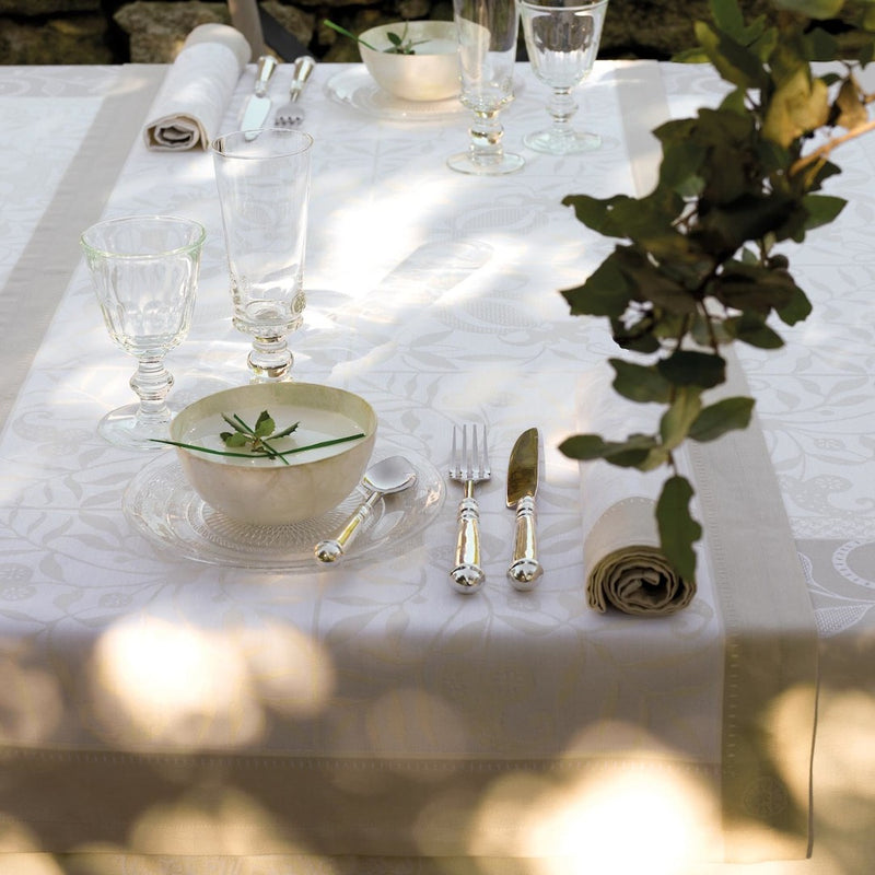 Venezia napkin by Le Jaquard Francais styled for an elegant table setting, sold at Amiramour