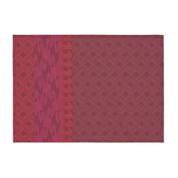 Red coated cotton placemat with retro inpired graphics by Le Jaquard Francais.