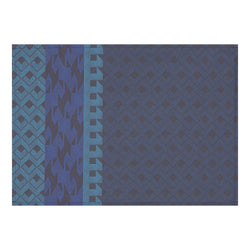 Blue coated cotton placemat with retro  graphics by Le Jaquard Francais.