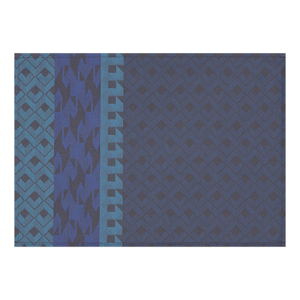 Blue coated cotton placemat with retro  graphics by Le Jaquard Francais.