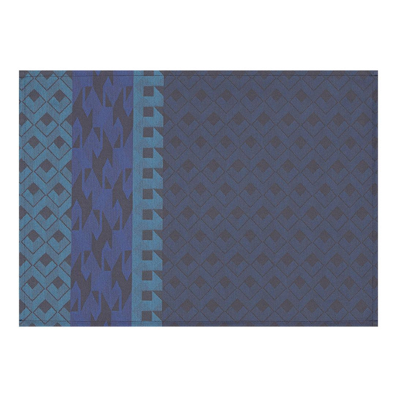 Blue coated cotton placemat with retro  graphics by Le Jaquard Francais.