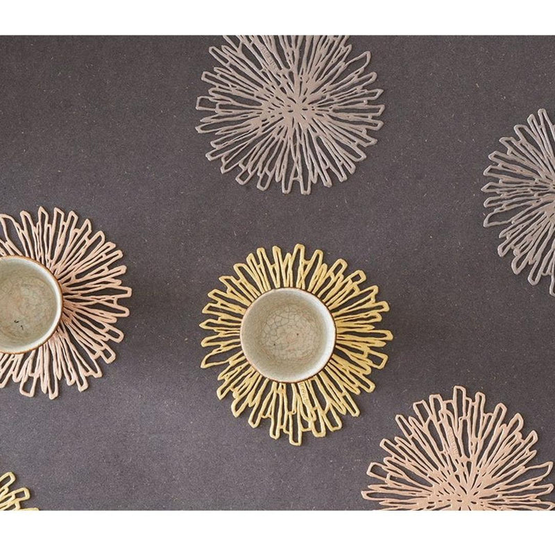 Drink Coasters Bloom from Pressed Vinyl in Gold