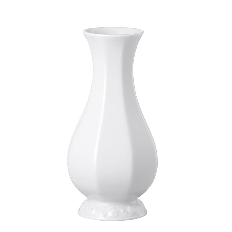 a white vase with a curved neck