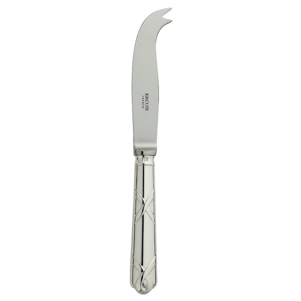 Silver-plated cheese knife with two prongs and ribbon motif handle.