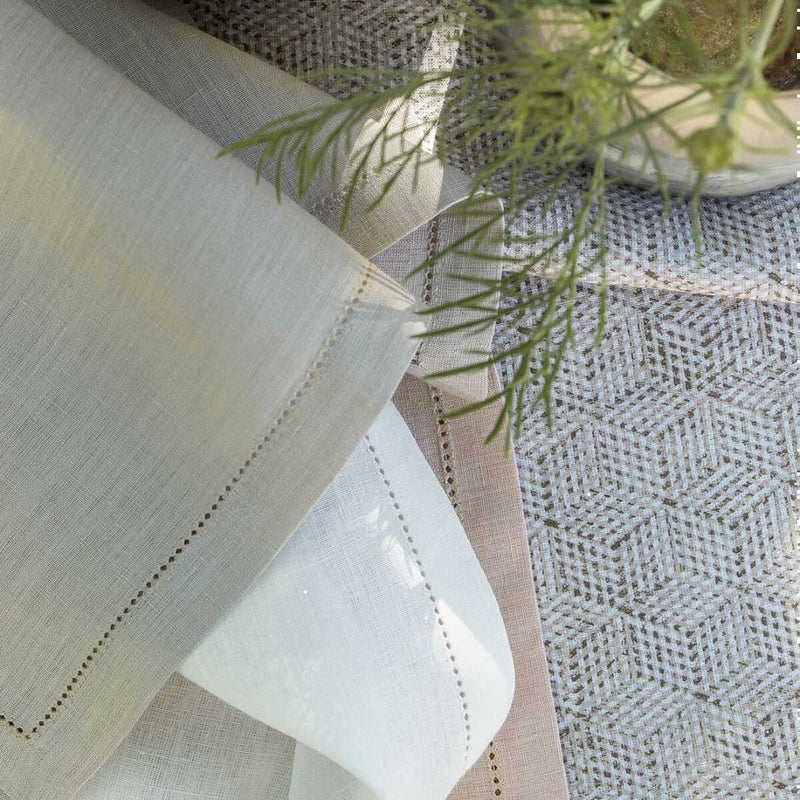 White linen napkin from the Florence collection close-up on its stitching