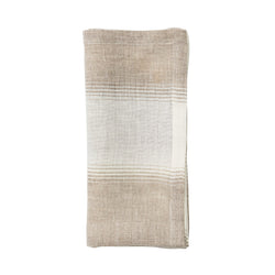 Folded Baltic ivory and beige striped linen napkin on white background by Amiramour