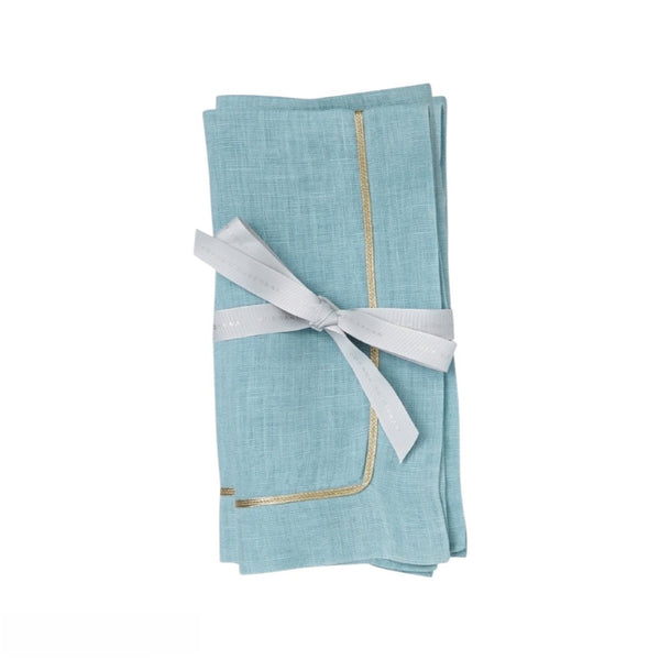 Duck egg blue linen napkin with gold trim by Joanna Buchanan, folded neatly on white background, sold at Amiramour.