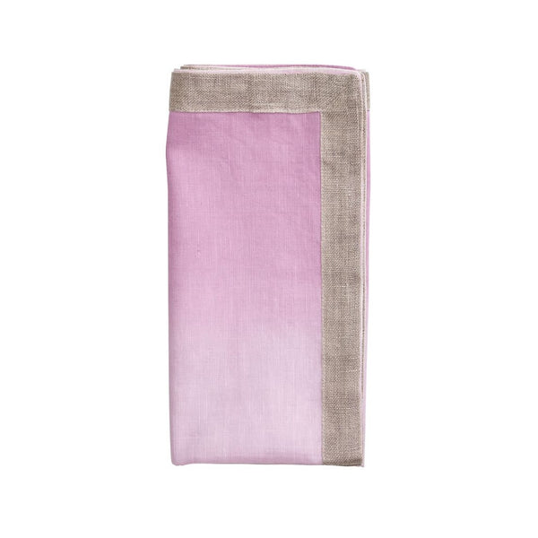Folded Dip Dye napkin in lilac and purple hues with metallic edge.