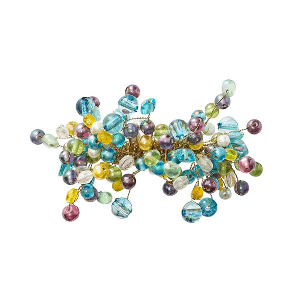 Top view of pastel beaded Spritz Napkin Ring by Kim Seybert with ocean spray-inspired design