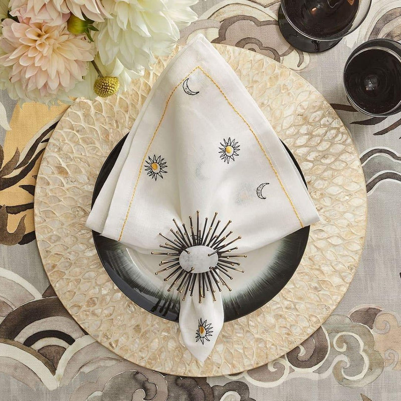 Flare napkin ring in black by Kim Seybert, styled with capiz placemat.