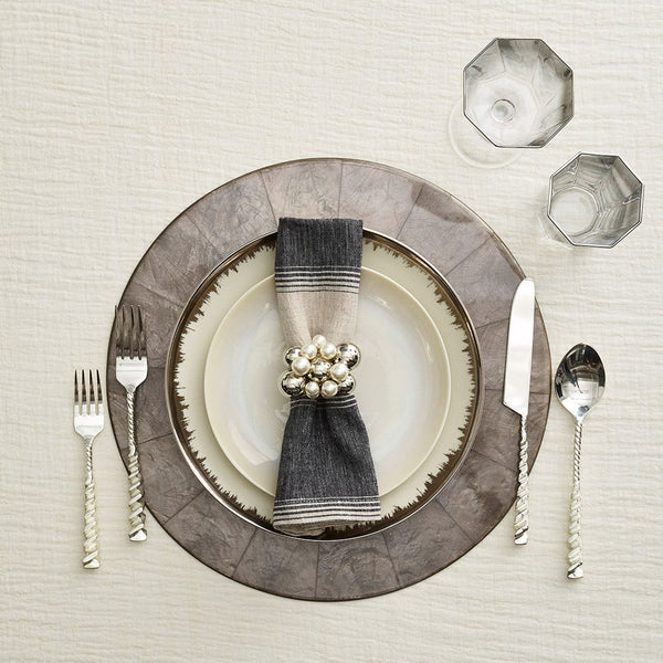 Luxury dinner table in grey with Bauble Napkin Ring in pearl and silver by Kim Seybert