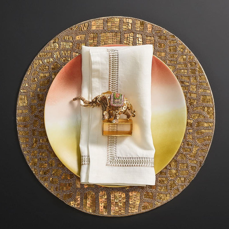 Summer table décor with warm hues and Mahout Elephant Napkin Ring by Kim Seybert