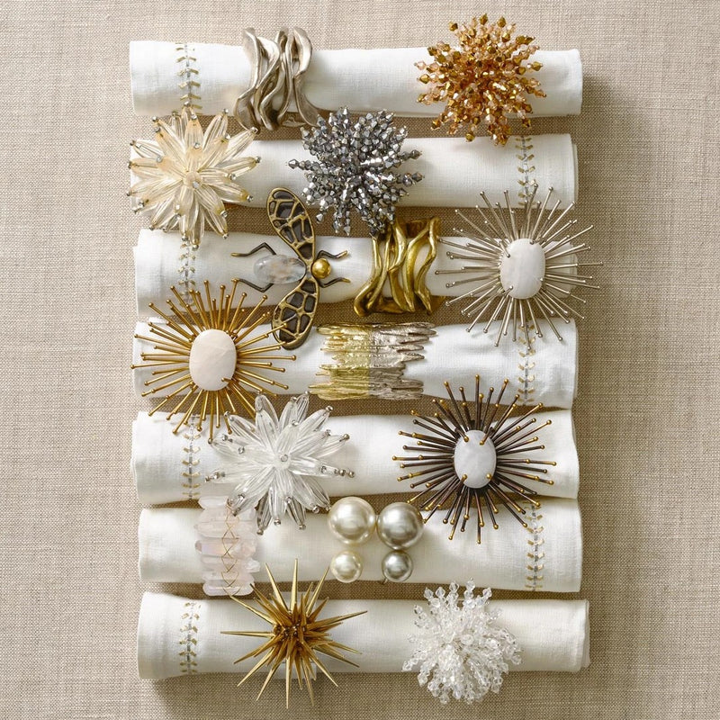 Curated collection of napkin rings including the Constellation design by Kim Seybert sold at Amiramour