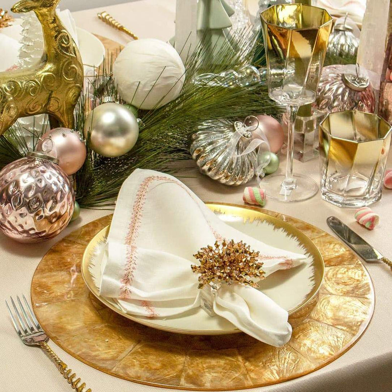 Christmas dining table with Brilliant Napkin Ring in gold by Kim Seybert
