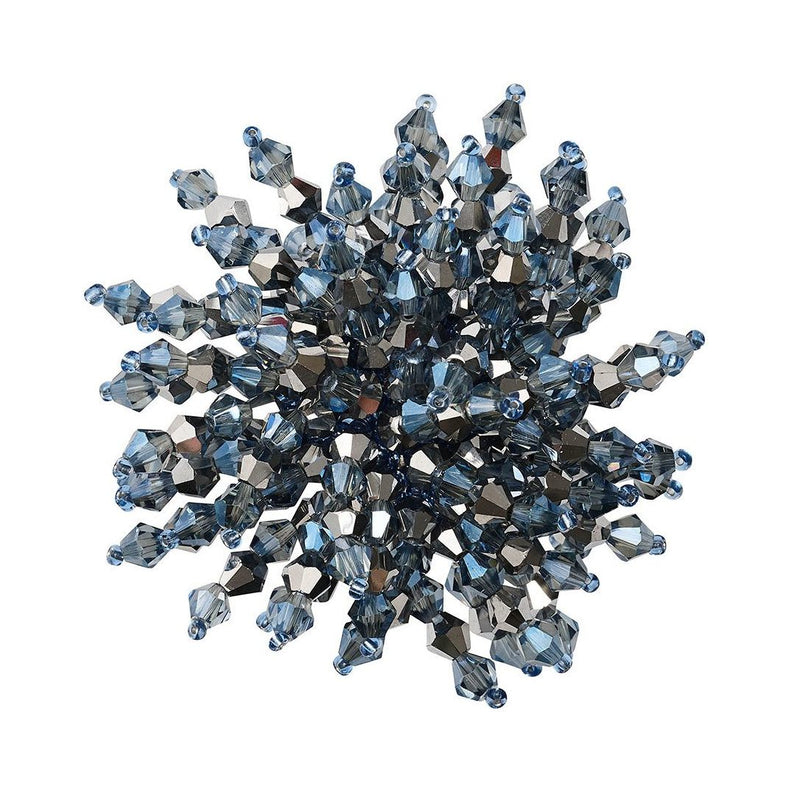 Top view of Brilliant Napkin Ring in midnight blue and silver by Kim Seybert