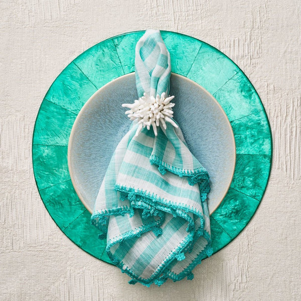 Mediterranean-style table setting with Amalfi napkin ring turquoise palette