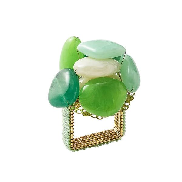 Front view of green Sea Stone Napkin Ring by Kim Seybert on white background