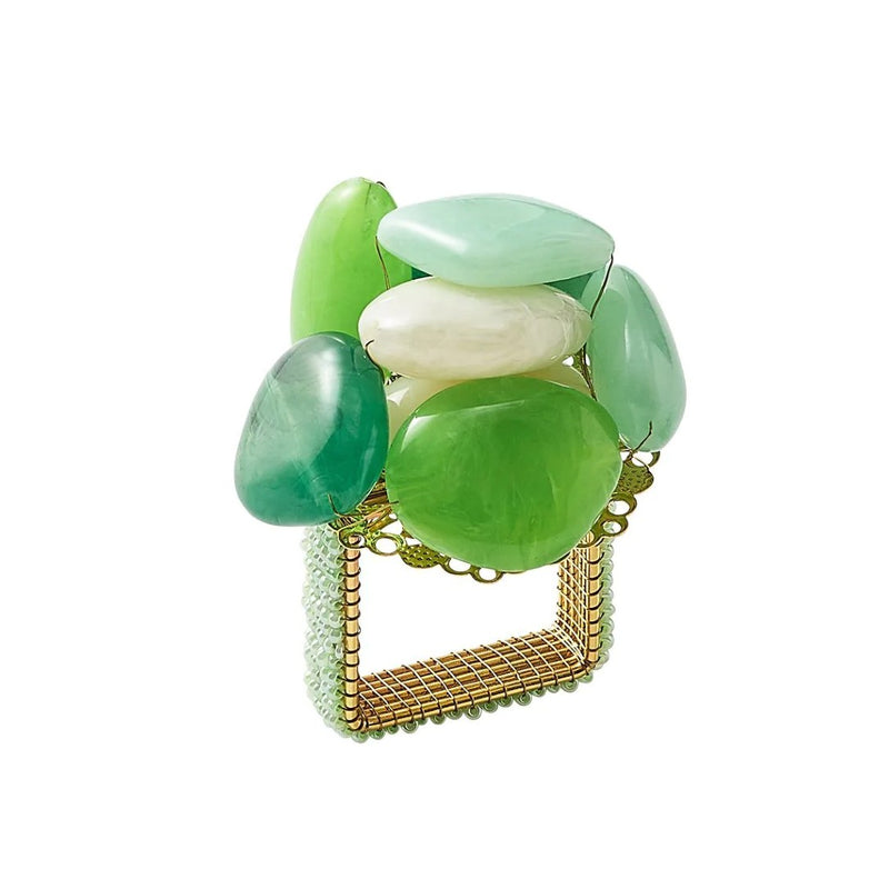 Front view of green Sea Stone Napkin Ring by Kim Seybert on white background