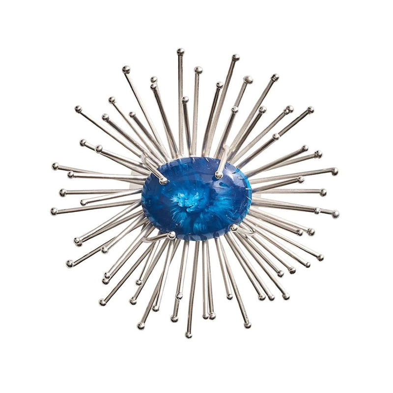 Top view of Flare Napkin Ring in cobalt and silver by Kim Seybert on white background