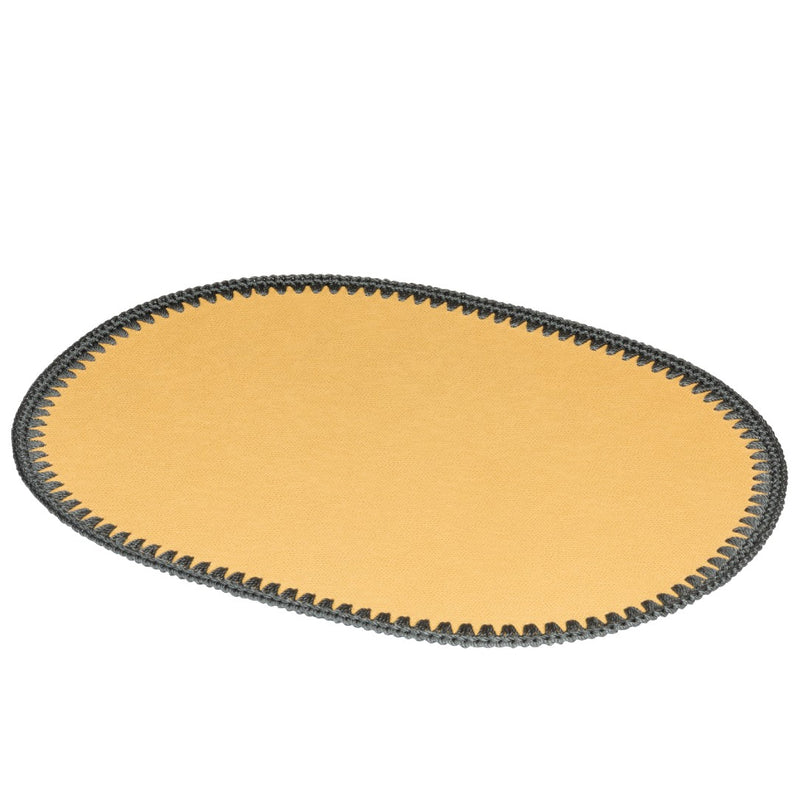 Yellow oval leather placemat with crochet border by Pigment France.