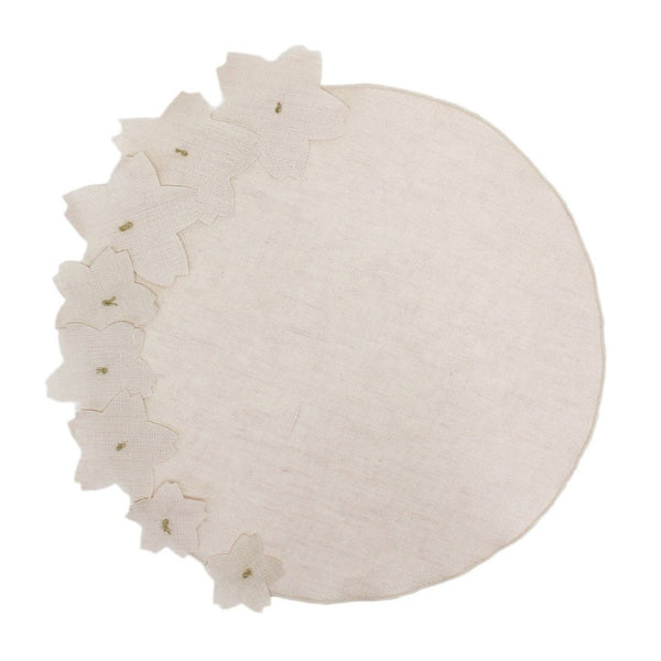Light pink linen placemat with 3D cherry blossom appliqué by Giardino Segreto.
