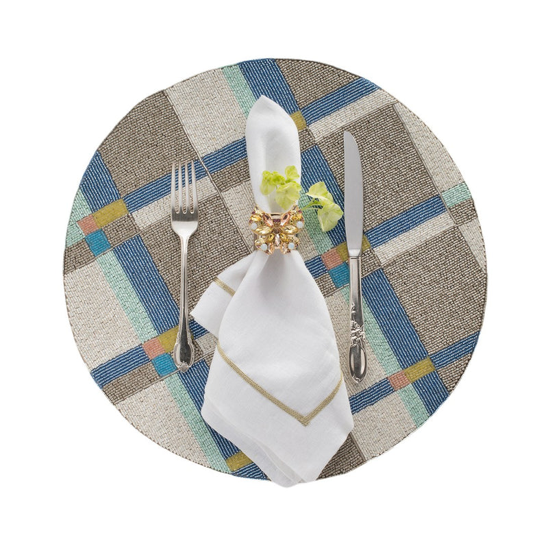 Yellow Jewelled Butterfly Napkin Rings by Joanna Buchanan displayed on a white napkin for a spring table setting