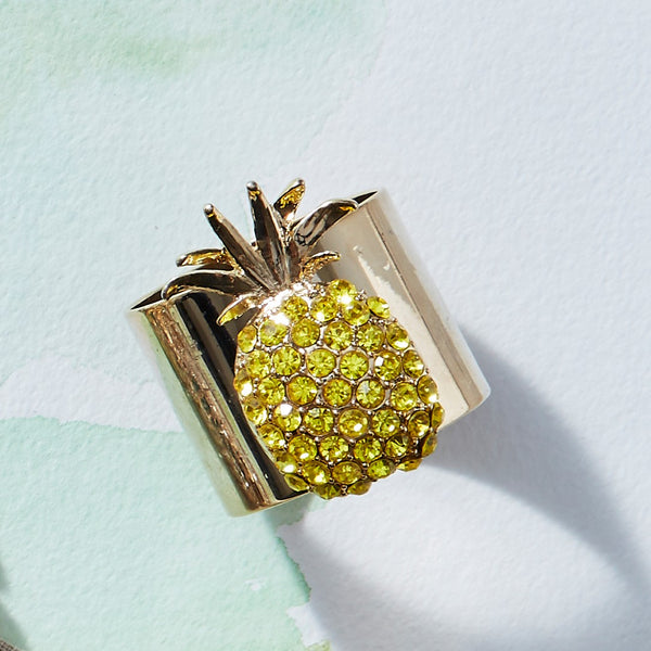 Pineapple Napkin Ring on watercolored green background