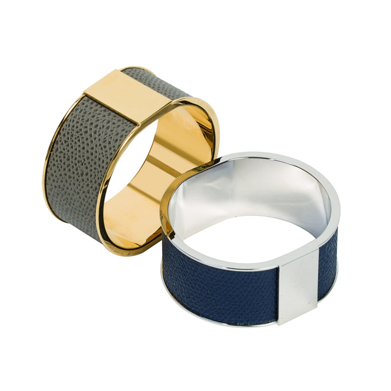Lux napkin rings by Giobagnara, with 24K gold-plated and chrome finishes.