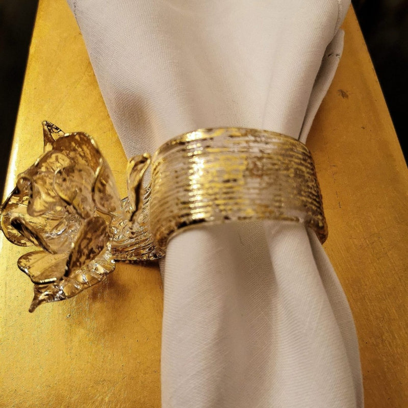 Romantic Murano glass napkin ring with gold detailing styled in elegant white tablescape, sold by Amiramour