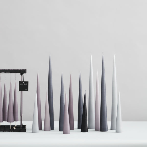 different shades of greys and white colour candle standing cones