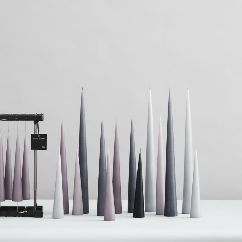 different shades of greys and white colour candle standing cones