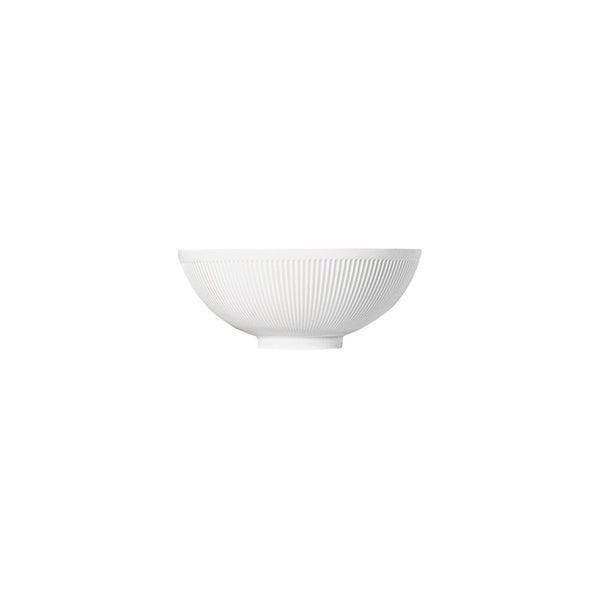 A white porcelain bowl with gentle relief lines and a shiny matte finish.