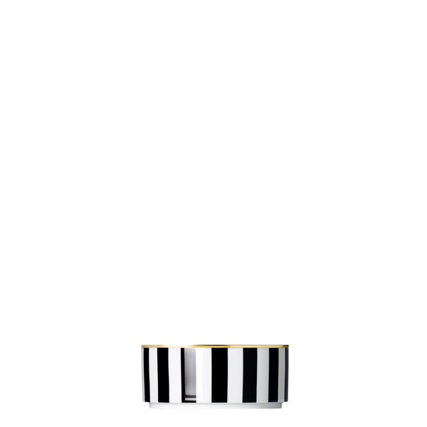 A porcelain small cylindrical bowl from my china ca d oro collection with black and white vertical stripes and gold rim by sieger furstenberg