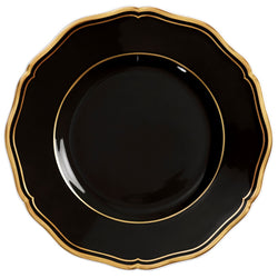 A porcelain bread and butter plate with scalloped edge black finish and gold rim from mazurka gold and black by raynaud