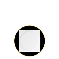 A porcelain bread plate from my china ca d oro collection with black square border white center and gold rim by sieger furstenberg on a black background.
