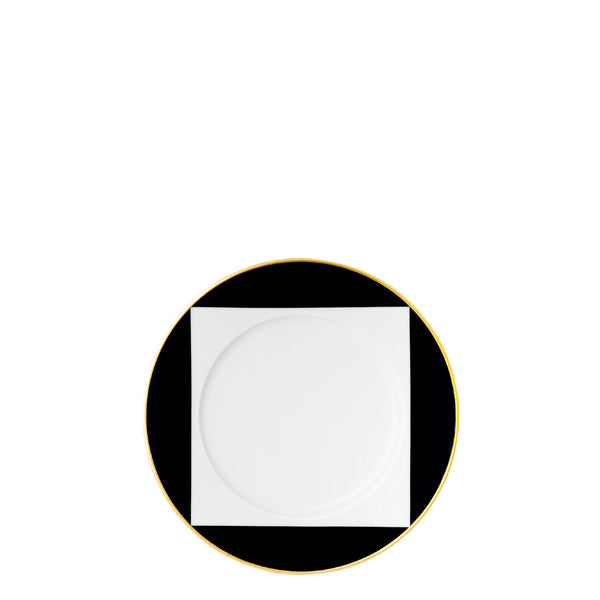 A porcelain bread plate from my china ca d oro collection with black square border white center and gold rim by sieger furstenberg on a black background.