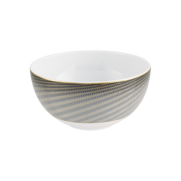 A white, gold, and brown geometric patterned porcelain bowl on a plain background.