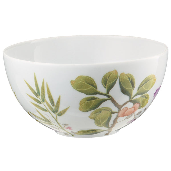 white bowl with leaves and flowers