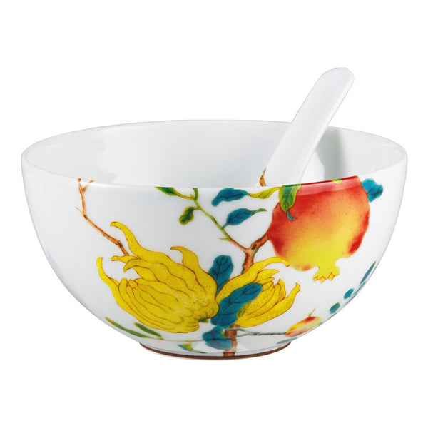 Harmonia luxury porcelain breakfast bowl with fruit and floral motifs inspired by Chinese imperial art by Raynaud and spoon inside
