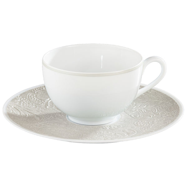 Italian Renaissance Irisé Pearl Grey breakfast cup and saucer by Raynaud in Limoges porcelain with engraved arabesques and pearl grey iridescence.