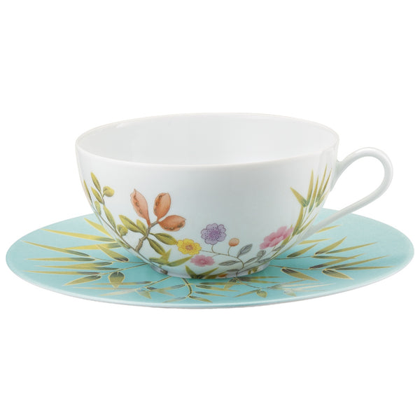 breakfast cup and saucer with floral design and turquoise saucer