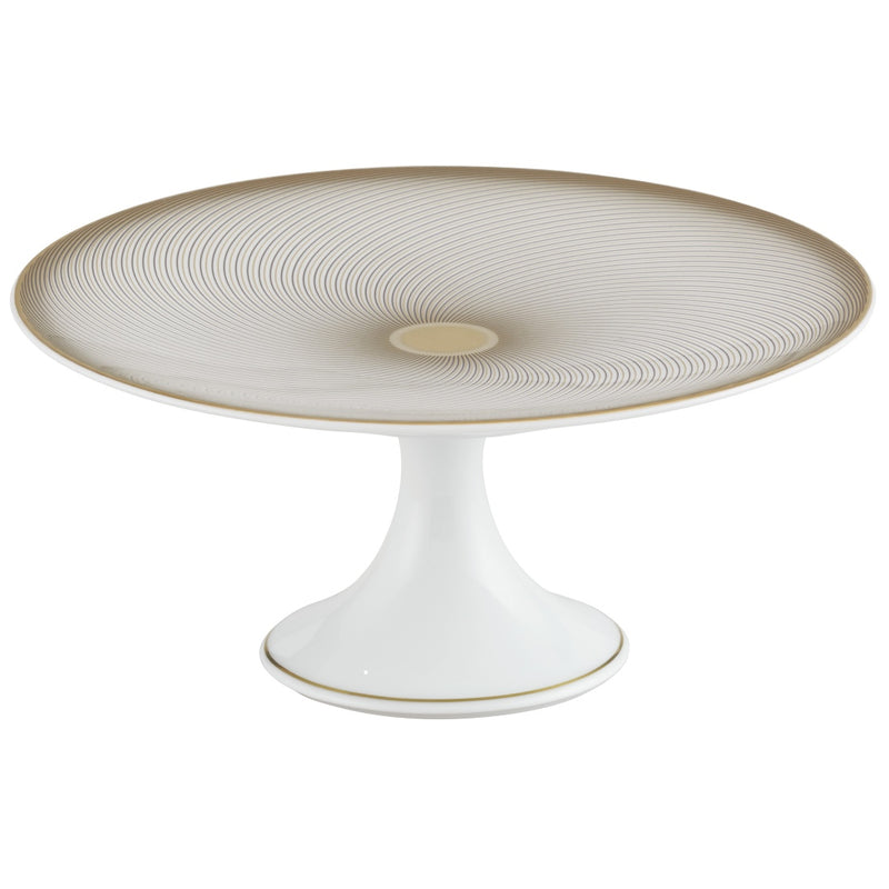 A white, gold, and brown Raynaud porcelain cake stand with a geometric pattern.