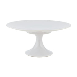 A white porcelain cake stand with a round top and a cylindrical pedestal base.