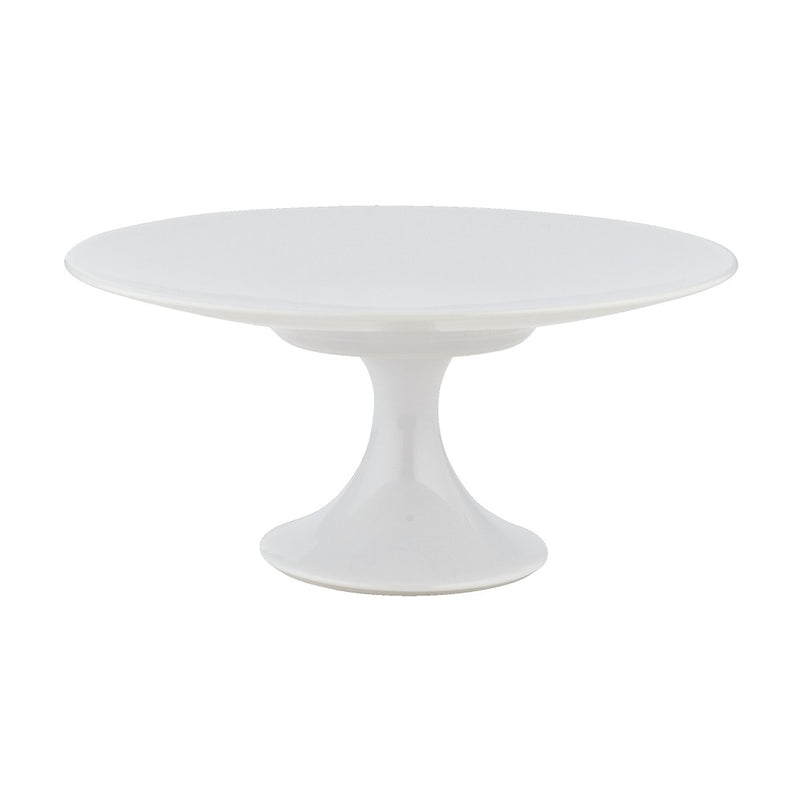 A white porcelain cake stand with a round top and a cylindrical pedestal base.