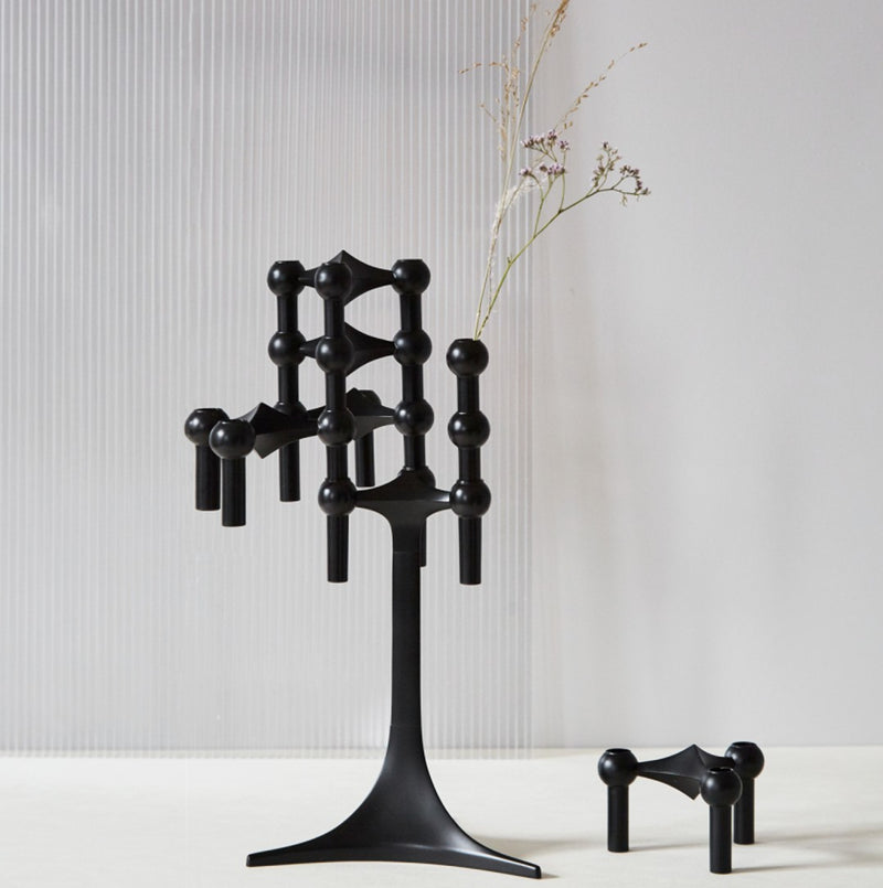 styled Matte black candle stand by Stoff Nagel, modular sculptural holder