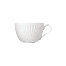 A white porcelain cappuccino cup with gentle relief lines and a heart-shaped handle, part of the Stella Satin White series by Sieger by Fürstenberg.