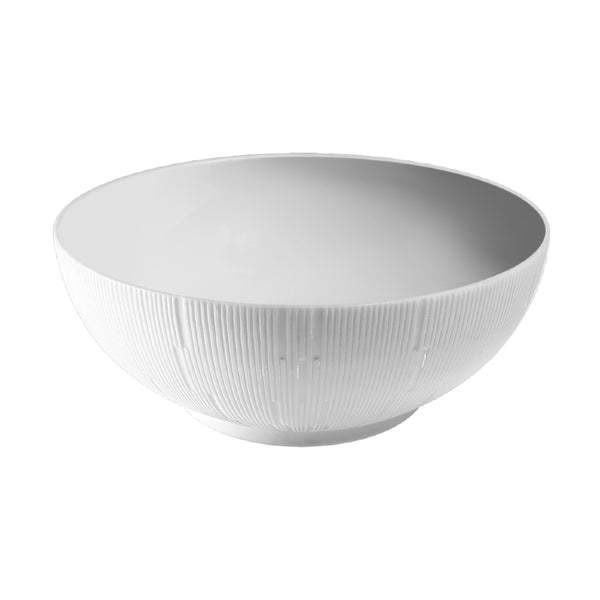 A white porcelain cereal bowl with a counter-relief engraving from the Infini collection.
